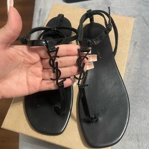 Saint Laurent Cassandra slingback sandal in black patent